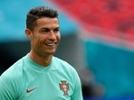 Portugal's Cristiano Ronaldo smiles during a team training session at the Ferenc Puskas stadium in Budapest.(AP) Portugal's Cristiano Ronaldo smiles during a team training session at the Ferenc Puskas stadium in Budapest.(AP)