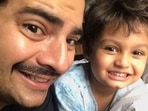 Karan Mehra poses with son Kavish. He has been accused of domestic violence by wife Nisha Rawal.