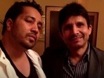 KRK and Mika Singh pose together. 