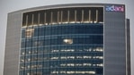 The logo of the Adani Group is seen on the facade of one of its buildings on the outskirts of Ahmedabad.(REUTERS) The logo of the Adani Group is seen on the facade of one of its buildings on the outskirts of Ahmedabad.(REUTERS)
