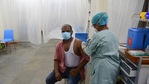 A man gets vaccinated at a vaccination center in Mumbai.(HT Photos) A man gets vaccinated at a vaccination center in Mumbai.(HT Photos)