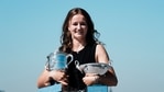 Czech Republic's Barbora Krejcikova holds the French Open tennis tournament women's cup, left, and women's doubles cup during a photocall.(AP) Czech Republic's Barbora Krejcikova holds the French Open tennis tournament women's cup, left, and women's doubles cup during a photocall.(AP)