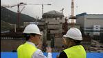 In this October 17, 2013 photo, then British chancellor of the exchequer George Osborne (left) chats with Taishan Nuclear Power Joint Venture Co Ltd general manager Guo Liming as he inspects a reactor under construction at the nuclear power plant in Taishan, southeastern China's Guangdong province. (AP) In this October 17, 2013 photo, then British chancellor of the exchequer George Osborne (left) chats with Taishan Nuclear Power Joint Venture Co Ltd general manager Guo Liming as he inspects a reactor under construction at the nuclear power plant in Taishan, southeastern China's Guangdong province. (AP)