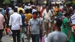 People shop at a market after the government eased restrictions as the number of new Covid-19 coronavirus infections dropped, in Gurgaon.(AFP) People shop at a market after the government eased restrictions as the number of new Covid-19 coronavirus infections dropped, in Gurgaon.(AFP)
