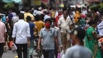 People shop at a market after the government eased restrictions as the number of new Covid-19 coronavirus infections dropped, in Gurgaon.(AFP) People shop at a market after the government eased restrictions as the number of new Covid-19 coronavirus infections dropped, in Gurgaon.(AFP)