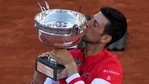 Novak Djokovic kisses the cup after defeating Stefanos Tsitsipas of Greece during their final match of the French Open tennis tournament at the Roland Garros stadium.(AP) Novak Djokovic kisses the cup after defeating Stefanos Tsitsipas of Greece during their final match of the French Open tennis tournament at the Roland Garros stadium.(AP)