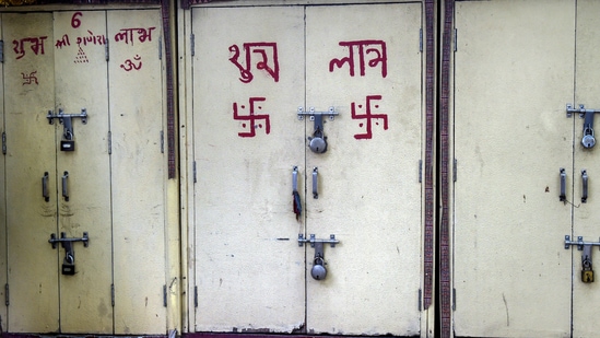 Locks hang on a store at Gujarati handicraft market in Janpath during the Covid-induced lockdown, in New Delhi, on June 13. With Covid-19 numbers in Delhi dropping to a three-month low, all market activities have been allowed from June 14, but with certain restrictions as part of the phased unlock plan of the Delhi government.(Manvender Vashist / PTI)