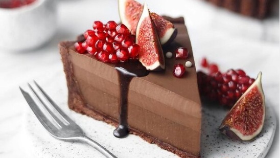 Red wine and chocolate tart: With the goodness of wine and dark chocolate, this dessert will become your next favourite recipe. Dust the tart with some cocoa. Slice and serve with the whipped cream. (Instagram/veganreciipes)