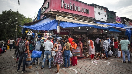 Shoppers at Sarojini Nagar Market in New Delhi, on June 13. Under the unlock guidelines, all market complexes are allowed to open between 10am and 8pm.(Sanchit Khanna / HT Photo)