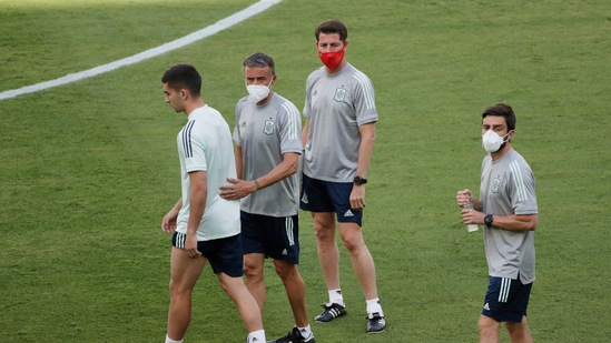 Spain coach Luis Enrique with his players during training.(Pool via REUTERS)