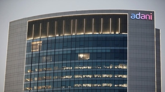 The logo of the Adani Group is seen on the facade of one of its buildings on the outskirts of Ahmedabad. (REUTERS)