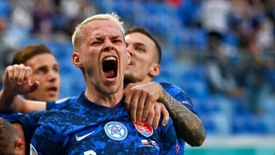 Slovakia's Ondrej Duda celebrates after Slovakia's Milan Skriniar scoring his side's second goal.(AP)