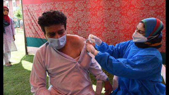 A man being vaccinated against Covid in Srinagar on Monday. (Waseem Andrabi) A man being vaccinated against Covid in Srinagar on Monday. (Waseem Andrabi)