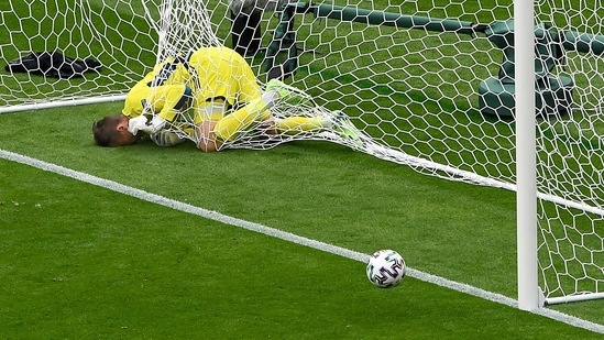 Scotland's goalkeeper David Marshall is caught in the goal's net after he failed to safe a long distance shot by Czech Republic's Patrik Schick. (AP) Scotland's goalkeeper David Marshall is caught in the goal's net after he failed to safe a long distance shot by Czech Republic's Patrik Schick. (AP)