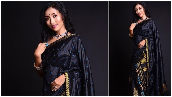 In this picture, Ankita can be seen donning a black and golden handwoven Assam silk mekhela chador.(Instagram/ankita_earthy)