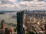 A view from the 64th floor as New York Gov. Andrew Cuomo speaks during a press conference at One World Trade Center on June 15, 2021 in New York City. (AFP) A view from the 64th floor as New York Gov. Andrew Cuomo speaks during a press conference at One World Trade Center on June 15, 2021 in New York City. (AFP)