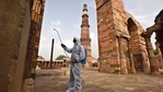 A worker chemically disinfects the premises at Qutub Minar complex, as the ASI Monuments are to reopen from tomorrow, in New Delhi, India, on Tuesday, June 15, 2021. (Photo by Raj K Raj / Hindustan Times) A worker chemically disinfects the premises at Qutub Minar complex, as the ASI Monuments are to reopen from tomorrow, in New Delhi, India, on Tuesday, June 15, 2021. (Photo by Raj K Raj / Hindustan Times)