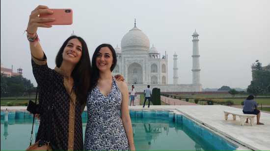 File photo of tourists taking a selfie at the Taj Mahal on September 21 last.