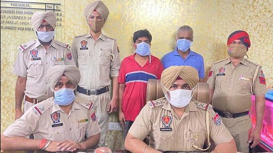 The accused in the custody of police in Ludhiana on Tuesday. (HT Photo)