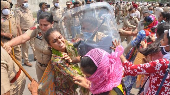 Unemployed teachers clashing with police during a protest near Punjab CM’s residence in Patiala on Tuesday. (PTI) Unemployed teachers clashing with police during a protest near Punjab CM’s residence in Patiala on Tuesday. (PTI)