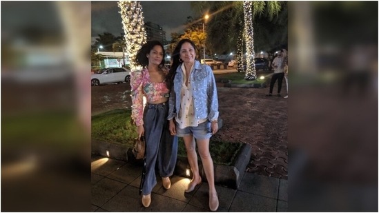Neena Gupta wore a cool printed shirt and layered it with a denim jacket in this picture. She teamed it with shorts and nude-coloured mules, nailing effortless vibes. Masaba complemented her mother in a floral crop top and baggy denim pants.(Instagram/@neenagupta)