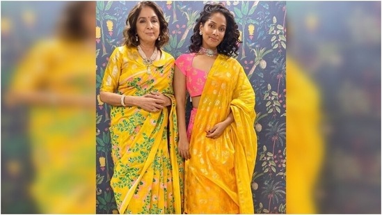 Taking twinning to the next level, Masaba and Neena wore traditional ensembles for the click. The Badhaai Ho actor wore a floral print saree with a brocade blouse. As for Masaba, she wore a pink brocade lehenga with a yellow brocade dupatta.(Instagram/@neenagupta)