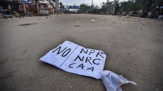 A poster lies at the protest site after it was cleared at Shaheen Bagh in New Delhi. (Biplov Bhuyan/ Hindustan Times)