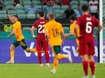 Wales' Aaron Ramsey runs to celebrate after scoring the opening goal during the Euro 2020 soccer championship against Turkey