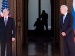 Russian President Vladimir Putin (L) looks on, next to US President Joe Biden (R), prior to the US-Russia summit at the Villa La Grange, in Geneva on June 16, 2021. 