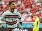 Portugal's Cristiano Ronaldo celebrates after scoring his second team goal during the Euro 2020 group F match against Hungary.(AP) Portugal's Cristiano Ronaldo celebrates after scoring his second team goal during the Euro 2020 group F match against Hungary.(AP)