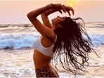Janhvi Kapoor jazzes up beach look in <span class='webrupee'>₹</span>3k bikini top and leopard print bottoms(Instagram/@janhvikapoor) Janhvi Kapoor jazzes up beach look in <span class='webrupee'>₹</span>3k bikini top and leopard print bottoms(Instagram/@janhvikapoor)