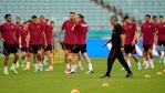 Turkey's manager Senol Gunes (front) supervises a team training session at the Baku Olympic Stadium(AP) Turkey's manager Senol Gunes (front) supervises a team training session at the Baku Olympic Stadium(AP)