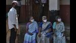 Elderly women wearing masks as a precaution against the coronavirus wait to vote for local body elections in Kochi, Kerala, December 10, 2020 (AP) Elderly women wearing masks as a precaution against the coronavirus wait to vote for local body elections in Kochi, Kerala, December 10, 2020 (AP)