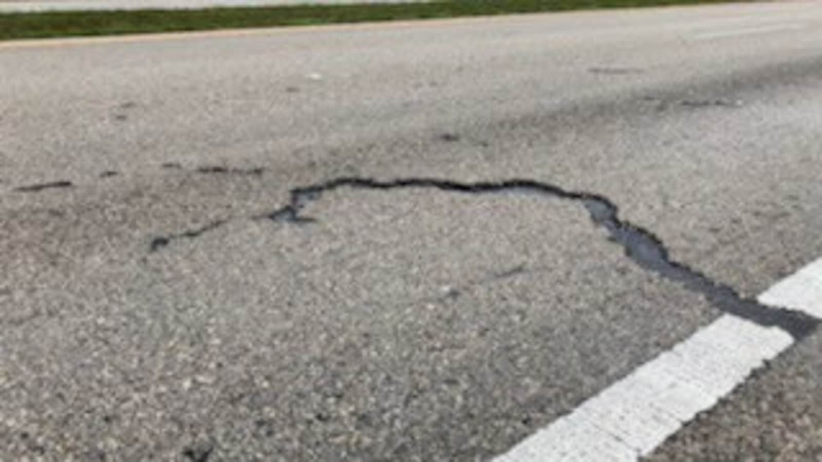 Lightning strikes car’s antenna in Florida, leaves crack in road. See