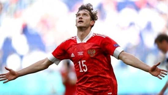 Russia's Aleksei Miranchuk celebrates after scoring the opening goal during the Euro 2020 soccer championship group B match between Finland and Russia at the Gazprom Arena stadium in St. Petersburg, Russia, Wednesday, June 16, 2021. (AP Photo/Kirill Kudryavtsev, Pool)(AP)