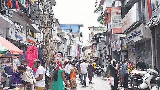 Shops on the right in this picture were closed on Tuesday, while those on the opposite side were open, as per the PCMC rules. (HT) Shops on the right in this picture were closed on Tuesday, while those on the opposite side were open, as per the PCMC rules. (HT)