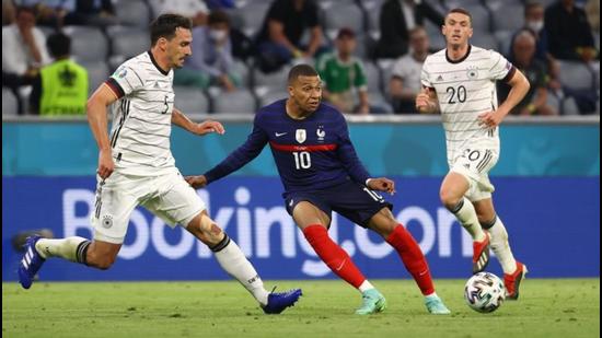 France’s Kylian Mbappe in action with Germany’s Mats Hummels during the Group F match of Euro 2020 in Munich on Tuesday. (Reuters)