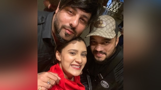 Aastha Gill poses with Badshah and Raftaar.