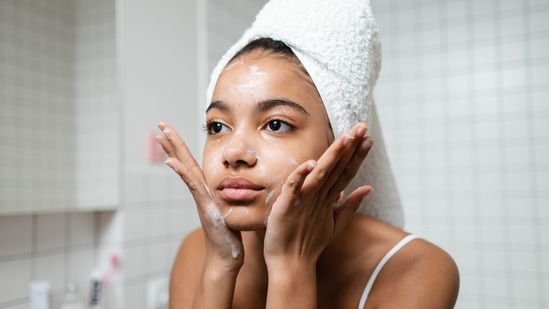 Lathering too much: Don't spend a lot of money on expensive face washes since it does no good to your skin. All you need is a gentle face wash and rinse with lukewarm water.(Pexels)