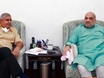 Bengal governor Jagdeep Dhankhar with Union home minister Amit Shah in New Delhi on Thursday. Dhankhar is learnt to have briefed Shah about the law and order situation in the state. (ANI Photo)