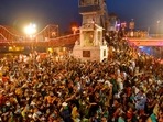Devotees gather to offer prayers at the Kumbh Mela in Haridwar on April 13. (PTI Photo)(PTI) Devotees gather to offer prayers at the Kumbh Mela in Haridwar on April 13. (PTI Photo)(PTI)