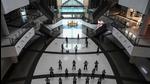 Private security guards attend a staff briefing before starting their duty at a shopping mall in Kolkata on June 15. (AFP) Private security guards attend a staff briefing before starting their duty at a shopping mall in Kolkata on June 15. (AFP)