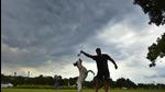 A man enjoys with his pet during the pleasant weather at india gate in New Delhi, India, on Sunday, July 30, 2017 (Raj K Raj/HT PHOTO) A man enjoys with his pet during the pleasant weather at india gate in New Delhi, India, on Sunday, July 30, 2017 (Raj K Raj/HT PHOTO)