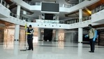 Workers clean and sanitize South City Mall ahead of its re-opening with certain restrictions, during ongoing Covid-induced lockdown, in Kolkata. (PTI) Workers clean and sanitize South City Mall ahead of its re-opening with certain restrictions, during ongoing Covid-induced lockdown, in Kolkata. (PTI)
