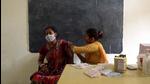 A woman get her first Jab of Covid vaccine at a school on the outskirts in Jharsa village, Gurugram , on Wednesday, June 16. (Vipin Kumar /HT photo) A woman get her first Jab of Covid vaccine at a school on the outskirts in Jharsa village, Gurugram , on Wednesday, June 16. (Vipin Kumar /HT photo)