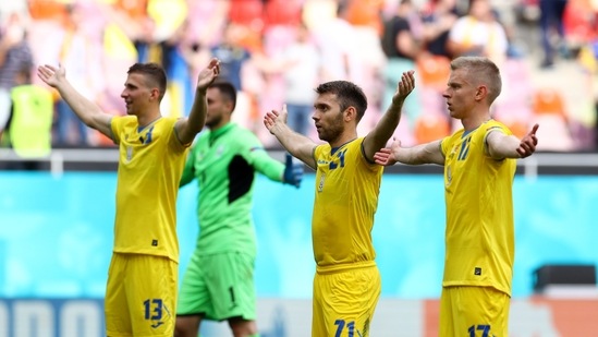 Soccer Football - Euro 2020 - Group C - Ukraine v North Macedonia - National Arena, Bucharest, Romania - June 17, 2021 Ukraine players celebrate after the match (Pool via REUTERS)