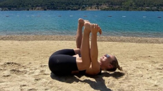 Happy Baby pose (Ananda Balasana): This is one of the easiest yoga poses which is usually done at the end of yoga sessions. It also relaxes the lower back, strengthens the legs, lengthens and realigns the spine, and opens the hips. (Instagram/@evgeniya_doganer_yoga)