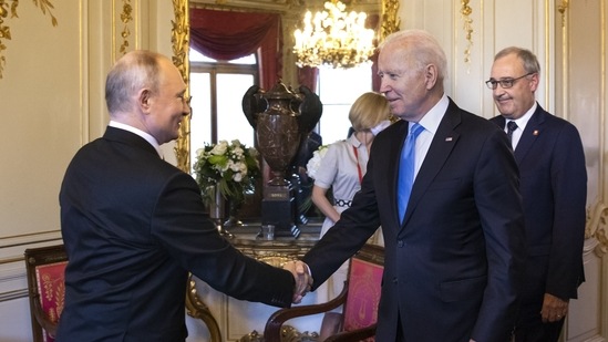 Vladimir Putin, Russia's president, left, and US President Joe Biden, centre, shake hands at the start of the US-Russia summit in Geneva. (Bloomberg) Vladimir Putin, Russia's president, left, and US President Joe Biden, centre, shake hands at the start of the US-Russia summit in Geneva. (Bloomberg)