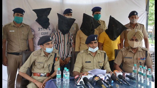 The accused in police custody in Manimajra on Thursday. (Sant Arora/HT)