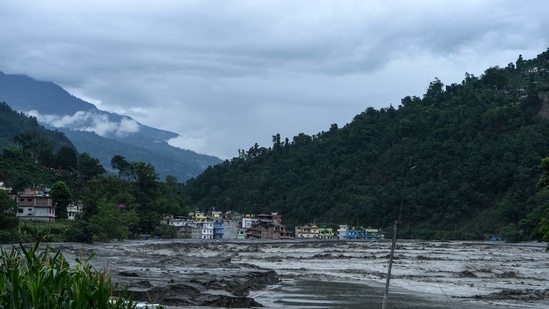 A view of houses submerged in floodwaters in Sindhupalchok, on June 16. As per Nepal's Meteorological Forecasting Division, the monsoon has already hit Nepal from June 1 and it will continue for about 3 months.(Prakash Mathema / AFP)